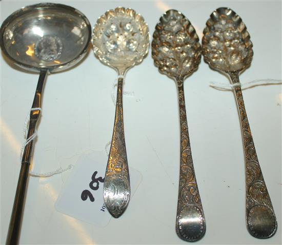 George III white metal punch ladle, inset Louis XVI coin, 1786, pair later embossed silver berry spoons & similar sifter spoon